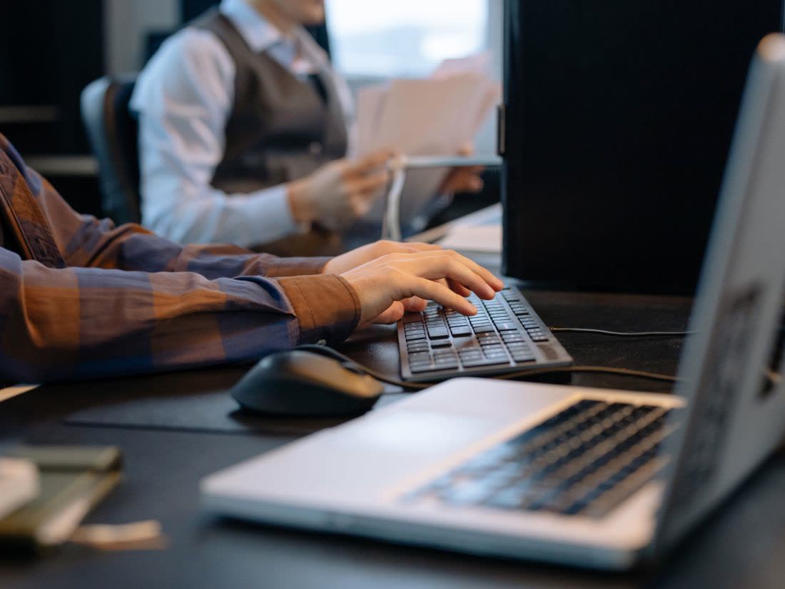 Reviewing paperwork at a desk